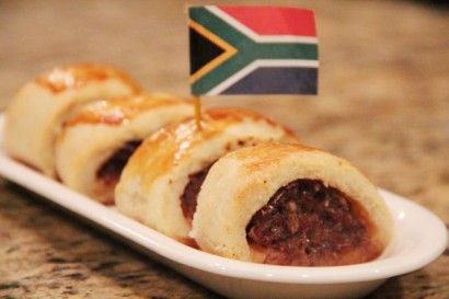 South African Sausage Rolls - A South African favourite of beef and pork blended together and baked in a sour cream pastry. South African Sausage, Africa Dishes, Africa Recipes, Sour Cream Pastry, South African Dishes, Pork Wraps, African Dishes, Beef And Pork, Sausage Roll