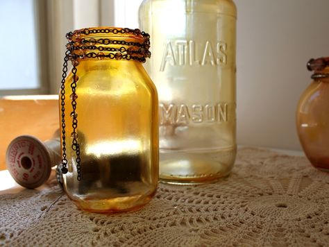 Make some faux amber glass with old jars, Mod Podge and food coloring to accent your fall decor. #AutumnColors Arbor Ideas, Jar Projects, Window Charm, Colored Mason Jars, Mason Jar Soap Dispenser, Concrete Ideas, Jar Art, Amber Glass Jars, Crystal Snowflakes