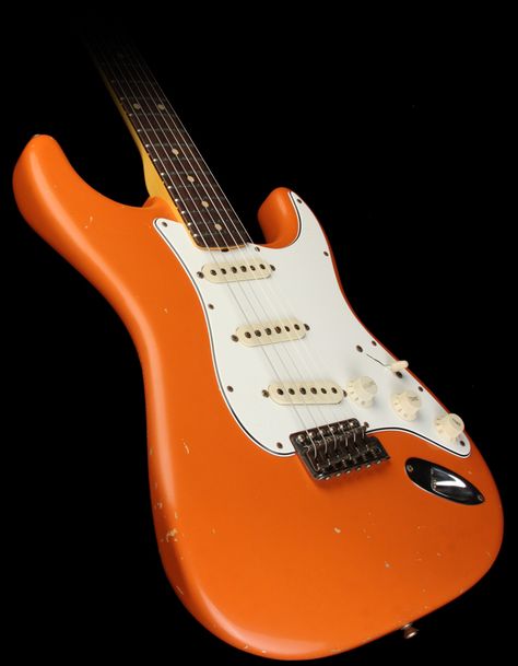 Orange fender stratocaster Orange Stratocaster, Orange Guitar, Aesthetic Guitar, Pedals Guitar, Taylor Guitars, Guitar Ideas, Guitar Store, Guitars Electric, Guitar Gear