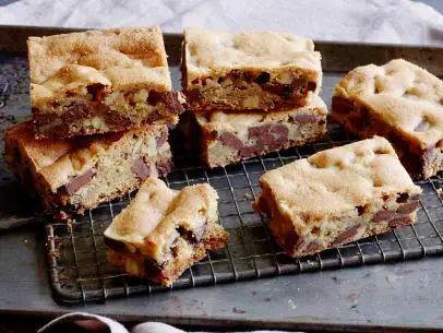 Chocolate Chunk Blondies Recipe | Ina Garten | Food Network Chocolate Chunk Blondies, Blonde Brownies, Barefoot Contessa Recipes, Resepi Biskut, Blondies Bars, Ina Garten Recipes, Blondies Recipe, Cooking Cookies, Bake Goods