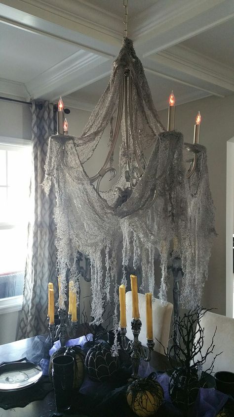 Gray Creepy Cloth and Flickering Light Bulbs Extravagant Halloween Decorations, Victorian Goth Halloween Decor, Classy Spooky Decor, Scary Halloween Centerpiece Ideas, Spooky Halloween Entryway, Black Cheesecloth Halloween Decor, Witch Theme Halloween Decor Living Room, Doorway Halloween Decorations, Classic Halloween Decorations