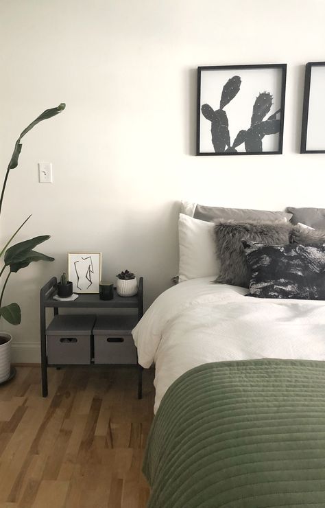 Black and white and green bedroom. Plant inspired bedroom. Sage White And Black Bedroom, Black And Sage Bedding, Green And Black Bedroom Ideas Aesthetic, Dark Green Bedroom White Walls, Sage Green White Black Bedroom, Black White Gray Green Bedroom, Green And Grey Room Aesthetic, Black White Green Wood Bedroom, Black White And Plants Bedroom