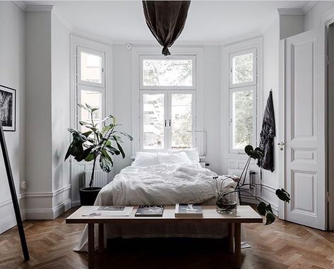 Dream on dreamer . Whats not to love about this stellar bedroom? It has all I could wish for: herringbone parquet wall panels plenty of light and the bed placed in front of the bay window plants and white bedsheets. @temporart totally rocked it! Listing: @husmanhagberg_stockholm Photo: @clearcutfactory #levaochbo Bay Window Plants, White Bedsheets, Dream On Dreamer, Condo Decor, Rustic Home Interiors, Window Plants, Victorian Bedroom, Gorgeous Bedrooms, Home Remodel