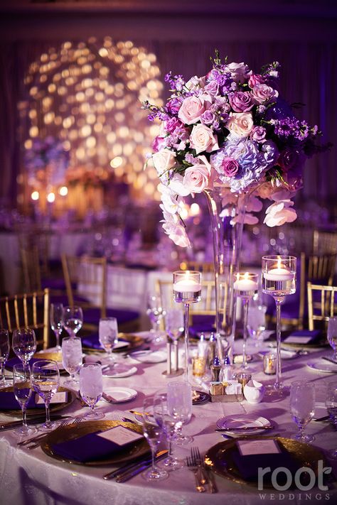 Erin and Tom's Rapunzel inspired wedding reception. Violet flowers, twinkle lights, and gold chiavari chairs.     #root_weddings #disneywedding #rapunzel #tangled #rapunzelwedding #atlastiseethelight #bestdayever #disneywedding #disbride #disbrides #violetwedding #violet #purplewedding Tangle Theme Wedding, Violet And Gold Wedding, Rapunzel Wedding Flowers, Shades Of Purple And Gold Wedding, Gold And Violet Wedding, Lavender Wedding Theme Flowers, Wedding Decor Purple And Blue, Wedding Ideas Purple And Gold, Tangle Centerpiece