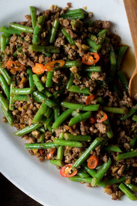 Stir-Fried Green Beans With Pork and Chiles Recipe - NYT Cooking Chinese Green Beans With Pork, Pork With Green Beans, Long Beans Recipe Chinese, Thai Green Beans Recipe, Traditional Chinese Recipes, Bean Feta Salad, Pork Green Beans, Chinese Green Bean Recipes, Roast Vegetable Salad