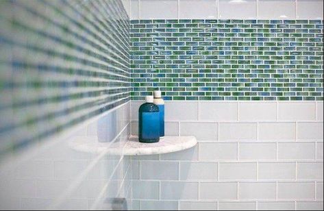 Tile moves from floors to the wall Shower Tile Accent Stripe, White Subway Tile Shower, Tile Tub Surround, Bathroom Tile Inspiration, Accent Tiles, Bathroom Gallery, Tub Tile, Glass Subway Tile, Tub Surround