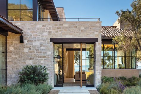 Visions Of European Hill Towns Come Alive On A Stunning Montecito Site - Luxe Interiors + Design 2024 House Plans, Wood Lintel, Wood Pivot Door, Olive Tree Landscape, Old World Modern, Pivot Doors Entry, Modern Ranch House Exterior, Narrative Structure, Modern Tuscan Home