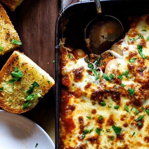 smitten kitchen on Instagram: "There is no time like a chilly day to bake giant white beans as if they were ziti — i.e. with a robust tomato sauce, vegetables, and finished with bronzed, melty cheese. We call them pizza beans because it brings more bean-skeptics to the table. Did I forget to mention that we serve them with garlic bread? I hope that sweetens the deal for you, too. // Pizza Beans on smittenkitchen.com or linked in profile. 

https://smittenkitchen.com/2017/09/pizza-beans-cookbook-preview/" Pizza Beans, Melty Cheese, Smitten Kitchen, Linked In Profile, White Beans, Recipes Dinner, Garlic Bread, Winter Food, The Deal