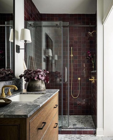 Our most recent color crush 😍 From moody maroons to beautiful burgundys, this shade creates spaces that are equal parts chic and comforting #SundaySaves 🤎 Moody Burgundy Bathroom, Dark Brown Moody Bathroom, Maroon Tile Bathroom, Maroon Bathroom Tiles, Oxblood Tile Bathroom, Moody Small Bathroom, Maroon Bathroom, Moody Bathrooms, Burgundy Bathroom