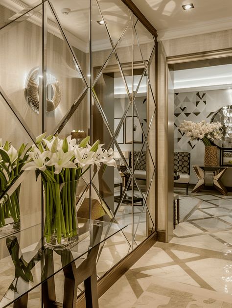 Narrow Entryway Ideas: Mirrored Wall with Geometric Patterns Entrance Wall Mirror Ideas, Hall Mirror Ideas Narrow Hallways, Mirror Wall Hallway, Mirror Design Wall Entryway, Hall Mirror Ideas, Narrow Wall Decor Ideas, Condo Entryway Ideas, Narrow Entrance Hall Ideas, Mirrored Hallway