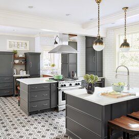 gray-white-kitchen-hanging-lights-patterned-tile-floor-3d052e1a Unusual Kitchen Layout, Pool House Kitchen, Petite Kitchen, Kitchen Cabinets Colors, Cabinets Colors, Gallery Kitchen, Best Kitchen Design, European Kitchens, Brown Kitchens