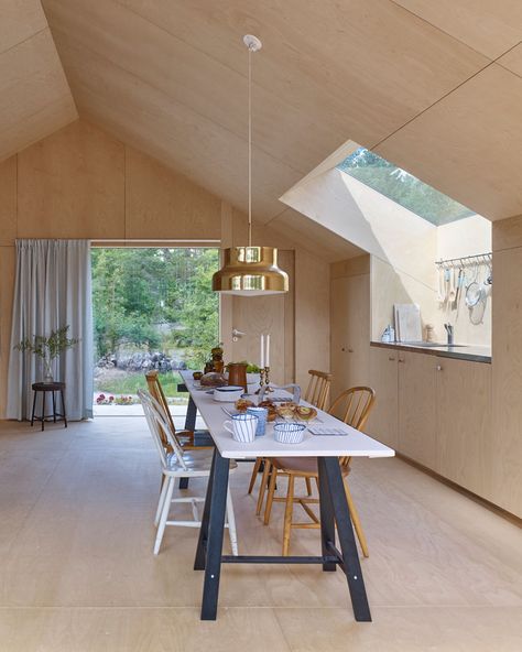 Blackened Plywood Covers The Exterior Of This Swedish Summer House Swedish Summer House, Plywood Ceiling, Plywood House, Plywood Interior, Plywood Walls, Wood Interiors, Modern Cabin, Kitchen And Dining Room, House Extensions