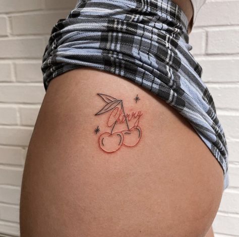 Cherry Tattoo On Hip Bone, Simple Tattoos Thigh, Clueless Tattoo, Cherry Hip Tattoo, Small Tattoos On Bum Cheek, Cherry Tattoo On Bum For Women, Name Tattoo On Buttcheek, Cherry Tattoo Buttcheek, Cherry Tattoo Placement Ideas