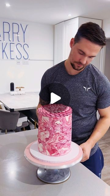 Harry Shakespeare on Instagram: "💕PINK💕  A marble effect pink buttercream cake 😍  This cake is all dairy free, something that can be a challenge with tall cakes to keep stable! This come came out good 🌱  The base of this tall 6 inch cake is vegan vanilla sponge with dairy free strawberry buttercream and homemade strawberry jam filling. Can’t wait to dive into this later!  This cake was made for my wife’s birthday today, we opt for dairy free so that our son Rio who has a  milk and eggs allergy can eat some too ❤️  Let me know what you think!  You can get my American buttercream recipe from my website HarryBakess.com I just swap out the unsalted butter block and cream for dairy free alternatives ✅  Colours @colour.mill code HARRY10 for 10% off Board @olbaa_cake_box  code HARRY10 for 10% Pink Buttercream Cake, Sponge Cake Decoration, American Buttercream Recipe, 6 Inch Cake, Butter Block, Pink Buttercream, Food Reels, American Buttercream, Buttercream Cake Designs