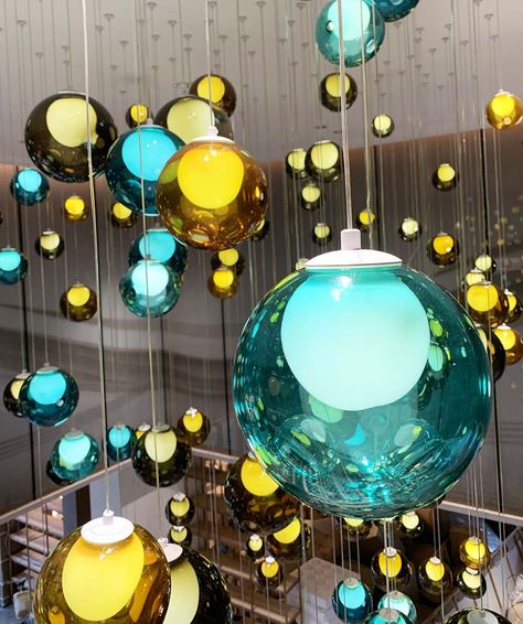 Every ball is an artwork, with its effect, other types of wall lamp and table lamp can be designed accordingly. The colorful large glass ball chandelier in the picture is composed by 300 pcs of creative murano glass balls hanging at different heights, each ball has a 5W LED light source.The custom  murano glass  balls chandelier  composing path features modern abstract style. Acrylic Chandelier, Ceiling Art, Custom Chandelier, Christmas Lighting, Flower Sculptures, Glass Balls, Art Lamp, Butler Pantry, Murano Glass Chandelier