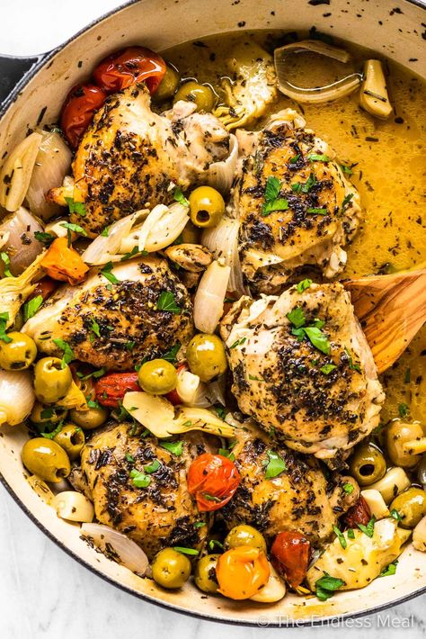 PIN TO SAVE! Chicken provencal is a flavorful French braised chicken recipe. Seasoned chicken thighs are first seared then braised in white wine with olives, shallots, garlic, artichoke hearts, and cherry tomatoes. It's easy to make and perfect for meal prep as leftovers taste amazing. #theendlessmeal #chickenprovencal #provencalchicken #chicken #french #frenchcuisine #frenchrecipe #frenchchicken #chickenrecipe #braisedchicken #coqauvin #glutenfree #paleo #healthydinner #easydinner #olives Chicken Provencal, Braised Chicken Recipes, Summer Chicken Recipes, Summer Chicken, Braised Chicken, Chicken Dish, French Cooking, Best Chicken Recipes, Chicken Dishes Recipes