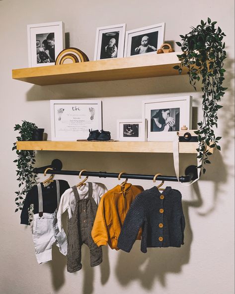 Nursery Shelves With Hanging Rod, Nursery Wall Hanger, Small Hanging Shelf Decor, Nursery Clothes Rail Ideas, Wall Mounted Clothing Rack Nursery, Floating Clothes Rack, Nursery Floating Shelves, Floating Shelves Decor, Corner Nursery