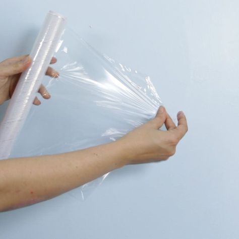 We had no idea you could do this with plastic wrap & glue, but it's actually brilliant Fix Hole In Wall, Fill Nail Holes, Patch Hole, Pvc Trim, Nail Repair, Home Fix, Nail Holes, Diy Home Repair, Home Repairs