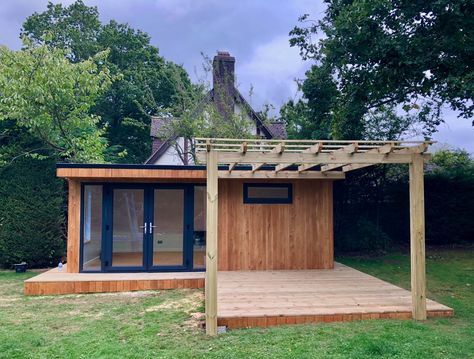 A beautiful garden room with a bespoke decking area and pergola. Garden Office With Pergola, Garden Room With Pergola, Garden Building Ideas, Upvc French Doors, Decking Options, Cabin Garden, Building Extension, Tranquil Garden, Cedar Cladding