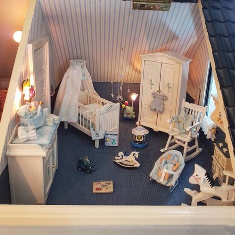 Marike's Dollhouse World on Instagram: “This is other nursery in my first Dollhouse. This one is for a baby boy. As I told you before I love nurseries and that's why this house…” Babydoll Nursery Playroom, Baby Doll Nursery Playroom, Wooden Barbie House, Dollhouse Themed Bedroom, Dollhouse Nursery Room, Victorian Nursery, Dollhouse Nursery Pottery Barn Kids, Popsicle Stick Houses, Dollhouse Nursery