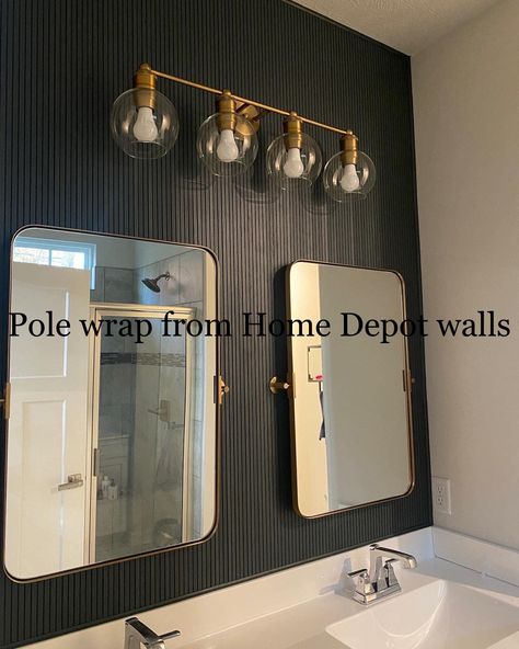 Pole Wrap Wall Bathroom, Cheap Bathroom Upgrades, Masculine Guest Bathroom, Bathroom Vanity Accent Wall, Wood Slat Accent Wall Bathroom, Pole Wrap Accent Wall Bathroom, Bathroom With Black Accent Wall, Pole Wrap Accent Wall, Black And Green Bathroom