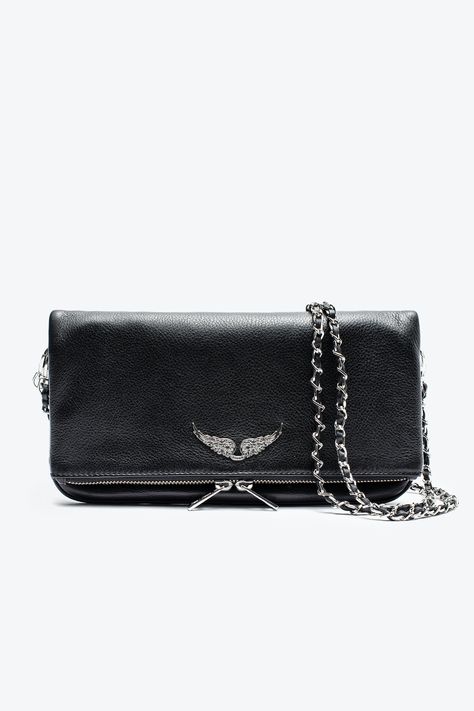 The iconic Rock clutch will take you seamlessly from day to evening. It features a double chain and leather strap, so you can choose to wear it across the body or on the shoulder. - Zadig&Voltaire Women’s Rock clutch in black leather - Worn on the shoulder or across the body - Removable chain - Adjustable and removable shoulder strap - Several compartments including a large, zipped interior compartment - Zipped pocket at the back - Zip closure - Flap with magnetic closure - Removabl Leather Wear, Zadar, Stockholm Fashion, Double Chain, Zadig And Voltaire, Womens Purses, Leather Clutch, Metal Chain, Cow Leather