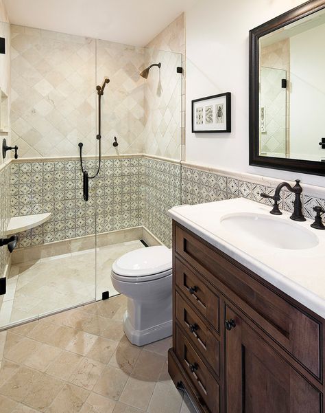 Spanish Mediterranean Elegance guest bathroom with hand painted tile wainscotting and limestone tile | Santa Barbara Mediterranean Mediterran Interior, Hacienda Bathroom, Mediterranean Style Bathroom, Spanish Mediterranean Homes, Spanish Style Bathrooms, Spanish Bathroom, Mediterranean Bathroom, Santa Barbara Style, Spanish Home Decor