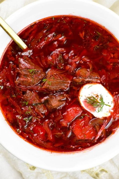 Bowlful of borscht served with sour cream and dill. Classic Borscht Recipe, Borscht Soup Recipe, Slavic Recipes, Russian Borscht Soup, Borscht Recipe, Ukrainian Food, Borscht Soup, European Dishes, Beet Soup