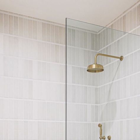 Bedrosians Tile on Instagram: "Large grout lines & stacked tile (emoji)  Shower Tile: Makoto 2.5x10 in Shoji White  Designed by @dagandesign" Stacked Tile, Bedrosians Tile, Shoji White, Loft Bathroom, Timeless Bathroom, White Shower, Bathroom Inspo, Grout, Shower Tile