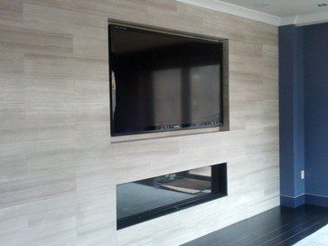 Fitting your TV inside a wall gives your room a sleek look. #InteriorDesign Tv Inside Wall, Recessed Tv, Speakers Design, Tv Stand Decor Living Room, Tuscany Home, Tv Above Fireplace, Above Fireplace, Tv Built In, Wall Design Ideas