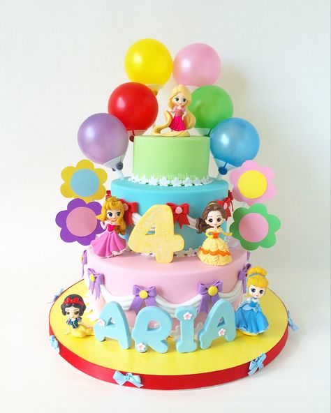 3 tier Disney Princesses themed birthday cake with balloons & flower toppers Disney Princesses Cake, Princesses Cake, Birthday Cake With Balloons, Cake With Balloons, Three Tiered Cake, Disney Princess Cake, 3 Tier Cake, Tiered Cake, Themed Birthday Cakes