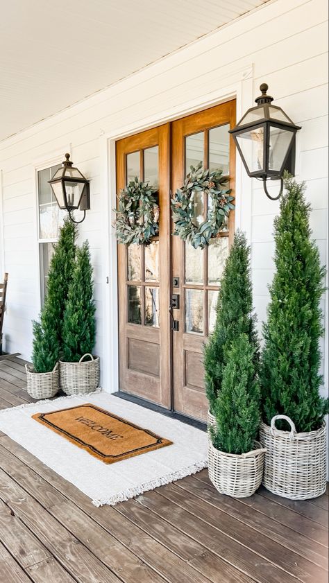 Front Porch Rockers Farmhouse, Pine Roping On Porch, Entry Way Trees, Fake Outdoor Plants Front Doors, Front Porch Trees, Porch Landscape, Beautiful Flower Gardens, Berry Wreaths, Front Porch Landscape