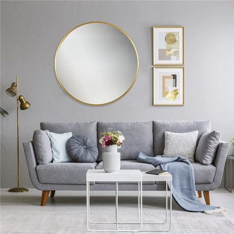 2 Round Mirrors On Wall Living Room, Round Mirror And Two Frames, Mirror Wall Above Couch, Gold Mirror Sofa, Round Mirror Living Room Wall, Round Wall Mirror Decor Living Room, Round Mirror With Pictures Around It, Round Mirror And Picture Wall Layout, Round Mirror Behind Couch