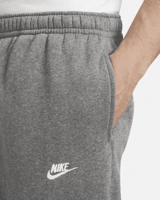 A closet staple, the Nike Sportswear Club Fleece Joggers combine a classic look with the soft comfort of fleece for an elevated, everyday look that you can wear every day. Shown: Charcoal Heather/Anthracite/White Style: BV2671-071 Grey Nike Sweatpants, Nike Sportswear Club Fleece, Nike Zip Up, Nike Sweatpants, Jogging Pants, Fashion Joggers, Grey Nikes, Fleece Joggers, White Style