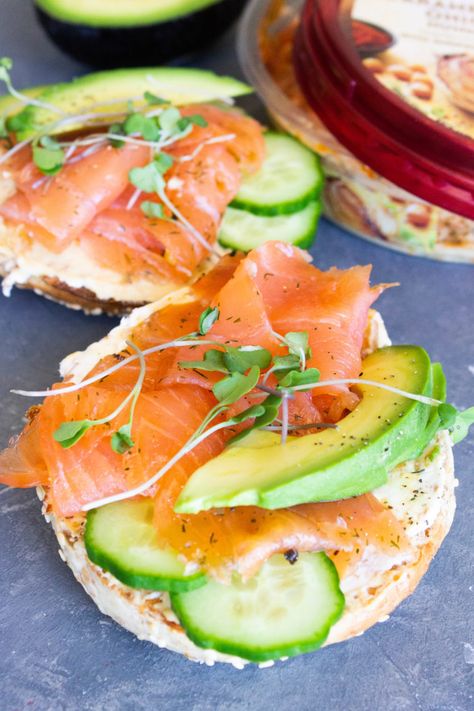 This perfect toasted Caramelized Onion and Smoked Salmon Bagel is layered with cream cheese, caramelized onion hummus, smoked salmon, avocado and cucumbers! Salmon Recipes Breakfast, Breakfast Salmon, Onion Hummus, Bagels Breakfast, Smoked Salmon Breakfast, Salmon Breakfast, Coast Kitchen, Smoked Salmon Bagel, Salmon Bagel