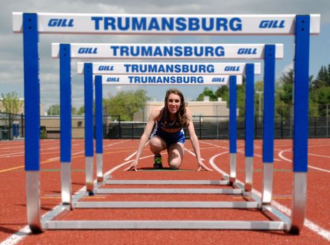 Color Hurdle Track Senior Pictures Track And Field Graduation Pictures, Hurdler Senior Pictures, Hurdles Senior Pictures, Track Senior Picture Ideas, Hurdle Senior Pictures, Track Pictures Poses Photo Ideas, Track Graduation Pictures, Senior Pictures Track, Track Pictures Poses