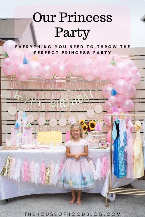 Chelsee from The House of Hood Blog shares her daughters 5th princess themed party! All the details from the balloon garland, decor, and extra special princess dresses! #birthdayparty #birthdaypartydecor #partydecor #partyinspo #birthdaydecor #partydecorinspo #princessparty #princessbirthday #diy #diyballoongarland Whimsical Princess Birthday Party, Dress Up Princess Party, Backyard Princess Party, Princess Party Game Ideas, Halloween Princess Party, Backyard Princess Birthday Party, Classy Princess Party, Princess 5th Birthday Party, Toddler Princess Party