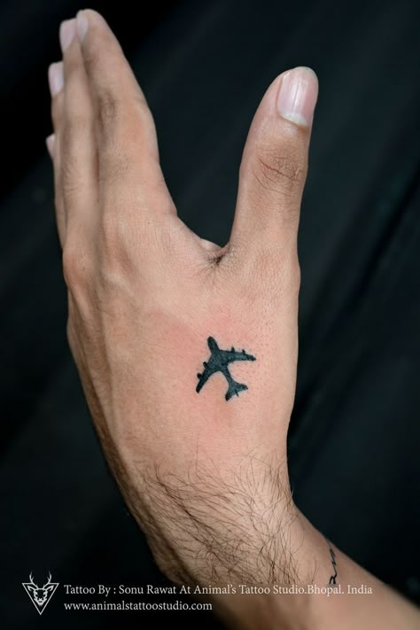 Do you love to travel ? then this plane tattoo is for you #traveling Airplane Hand Tattoo, Travel Tattoo Ideas Men, Basketball Tattoos, Airplane Tattoo, Tattoo Ideas Males, Plane Tattoo, Airplane Tattoos, Simple Tattoos For Guys, Animals Tattoo