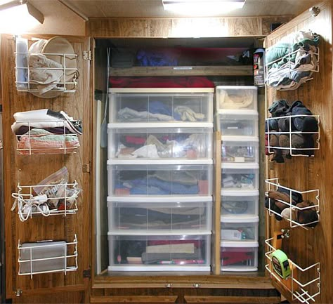 Storage ideas for RV Closets - When you don't have enough space for all your clothes but you still want to look nice while traveling, it's important to organize what space you do have! Make the most of ALL the space by adding some wire baskets to the inside of the closet door. Rv Closet, Travel Trailer Organization, Trailer Organization, Camper Organization, Camping 101, Rv Organization, Kombi Home, Camper Storage, Rv Storage