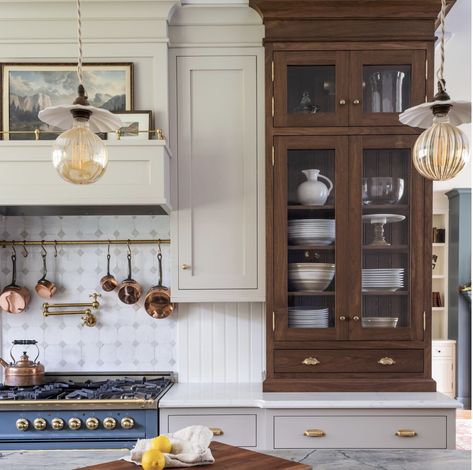 Cottage Kitchen Hood Ideas, On The Counter Cabinet, Stained Wood Pantry Cabinet, English Country Kitchen Cabinets, Vintage Upper Kitchen Cabinets, Two Wood Tone Kitchen Cabinets, Cabinet On Top Of Counter, Counter Cabinet Kitchen, Old Money Home Aesthetic