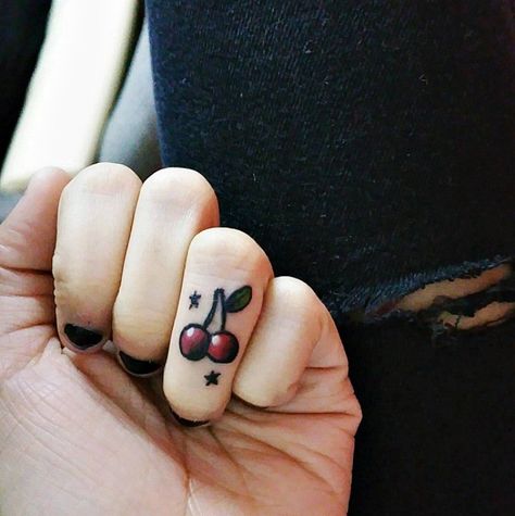 This tiny + colorful cherry finger tattoo is the perfect subtle pop of color to your ring finger. Tattoo Arrow, Cherry Tattoo, Tiny Finger Tattoos, Cherry Tattoos, Finger Tattoo For Women, Finger Tats, Ring Finger Tattoos, Latest Tattoos, Arrow Tattoos