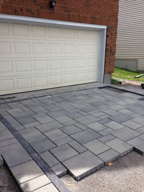 Interlock driveway in Ottawa, in the process of laying the pacers  www.deckottawa.con NewFound - Land, Fence & Decks Cheap Paving Ideas, Stone Patio Designs, Design Per Patio, Modern Driveway, Driveway Ideas, Paving Ideas, Paver Designs, Patio Pavers Design, Driveway Paving