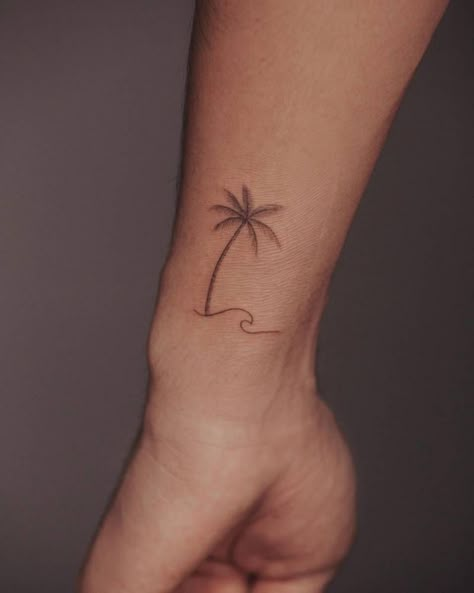 Sun Tattoo Inspiration, Palm Tree Wave Tattoo Ankle, Small Coconut Tree Tattoo, Palm Tree And Water Tattoo, Aesthetic Palm Tree Tattoo, Small Palm Tree Tattoo Wrist, Palm Tree Tattoo On Wrist, Tattoo Ideas Palm Tree, Palm Tree And Wave Tattoo Ankle