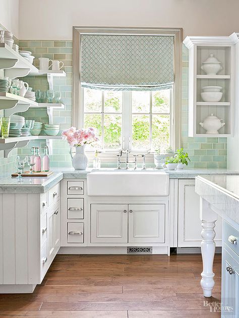 Whether cast iron, fireclay, soapstone, copper, or stainless steel, apron-style sinks immediately say country kitchen. These sinks become workstation focal points when enhanced with chrome or polished nickel vintage-look bridge faucets. Round out the period design with old-fashioned door hardware, like the bin pulls and small knobs pictured here. Cocina Shabby Chic, Shabby Chic Decorating, Chic Kitchen Decor, Shabby Chic Kitchen Decor, Decoration Shabby, Cottage Shabby Chic, Smart Tiles, Estilo Shabby Chic, Small Bedrooms