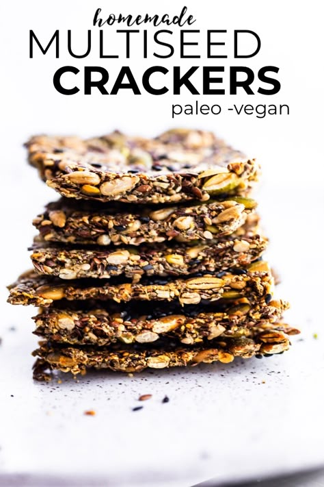 These healthy crackers are a tasty homemade snack, and with 4 types of seeds, they’re full of nutritional benefits, too! No flour or nuts means this recipe is grain-free, paleo, and vegan. #vegan #paleo #crackers #healthy #snack Healthy Nut And Seed Crackers, Gluten Free Seed Crackers Recipe, Flour Free Crackers, Healthy Seed Crackers, Keto Seed Crackers Recipe, Grain Free Crackers Recipe, Healthy Seeded Crackers, Norwegian Seed Crackers, Nut And Seed Crackers