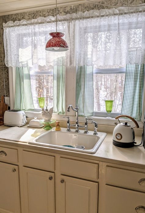 New lace valance, teakettle and toaster. Teatowels as curtains. Loving the vintage vibe in my kitchen English Cottage Kitchen Curtains, Vintage Curtains Kitchen, Vintage Kitchen Window Curtains, Cottage Curtains Ideas Kitchen, Small Kitchen Curtains, Vintage Kitchen Curtain Ideas, Kitchen Cottage Curtains, Cute Kitchen Curtains, Cottage Core Kitchen Curtains