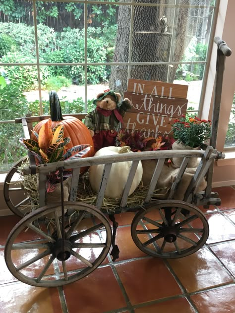 Prim fall wagon.. Radio Flyer Wagon Fall Decor, How To Decorate A Wagon For Fall, Fall Decorations With Wagon, Wagons Decorated For Fall, Red Wagon Fall Decoration, Easy Fall Porch Decorations, Vintage Fall Decor Ideas, Goat Cart, Wagon Decor