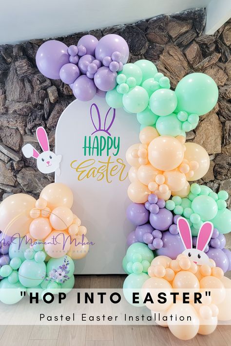 It's time to hop into Easter décor! This fun pastel installation with custom sign and bunny cutouts are perfect for your next Easter community event or small egg hunt party with the kiddos. Inquire today to find out how we can make your next moment memorable! Easter Party Theme Ideas, Easter Egg Backdrop, Easter Balloons Garland, Easter Decor Party, Easter Ballons Arch, Easter Events For Kids, Easter Decorations Party, Easter Party Backdrop, Easter Decorations Outdoor Party