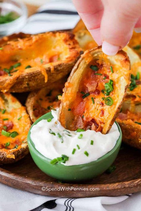 Homemade Potato Skins are one of my absolute favorite appetizer recipes! These easy baked potato skins are deliciously crispy with a garlic buttered exterior and then fully loaded with bacon, cheese and green onions! #spendwithpennies #potatoskins #appetizer #easyrecipe #easyappetizer #homemade #bakedpotatoskins #bakedappetizer #potatoskinsrecipe #snack Homemade Potato Skins, Easy Baked Potato, Baked Potato Skins, Potatoe Skins Recipe, Canned Potatoes, Twice Baked Potatoes Casserole, Bite Size Snacks, Sweet Potato Skins, Cream Dip