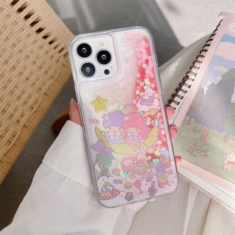 Add a dreamy touch to your phone with this enchanting Little Twin Stars liquid glitter case! Designed with a mesmerizing quicksand effect, this case sparkles with every movement, creating a dazzling starry night aesthetic. The durable acrylic back and soft TPU edges provide excellent protection while maintaining a lightweight feel. Materials: High-quality Acrylic + Soft TPU Style: Sparkly, Kawaii, Sanrio-Inspired, Glitter Aesthetic Feature: Liquid Glitter Quicksand, Shockproof, Scratch-Resistant, Raised Lens Protection, Slim Fit Starry Night Aesthetic, Glitter Aesthetic, Cute Twins, Blue Iphone, Kawaii Sanrio, Glitter Case, Cover Iphone, Twin Stars, Pink Iphone